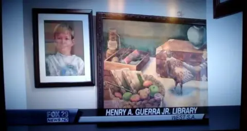 Television news still covering a Kristin Sue Kim exhibition